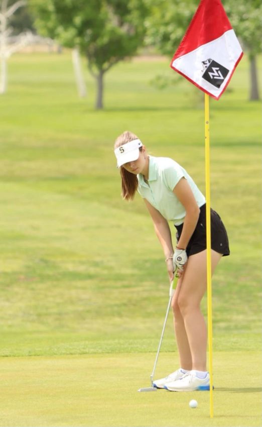 Gwen Poelman Giving Lessons at a Golf Course in Salt Lake City